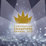 Blue grey image with sparkles. superimposed on top is a gold crown and the words coronation champions awards 2023