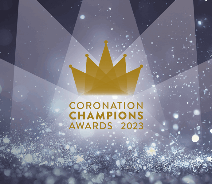 Blue grey image with sparkles. superimposed on top is a gold crown and the words coronation champions awards 2023